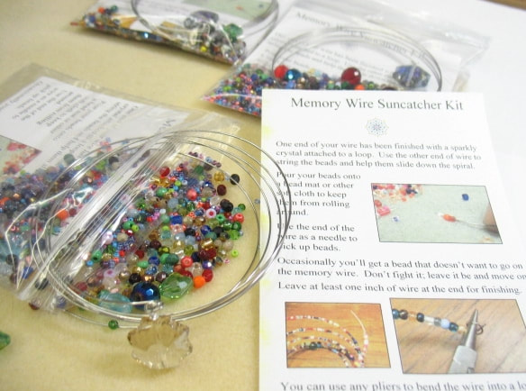 Make your own suncatcher with memory wire and beads.